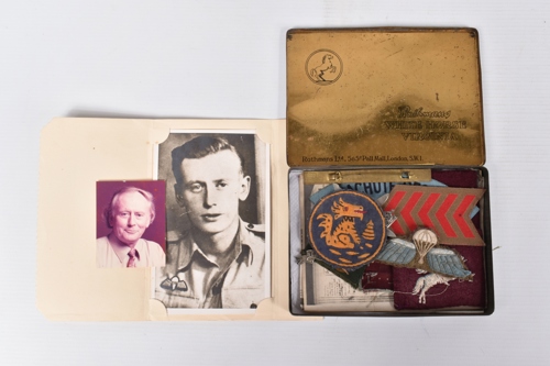 The lot includes a photo of Eastbury in uniform and in later life plus his Chindits insignia.