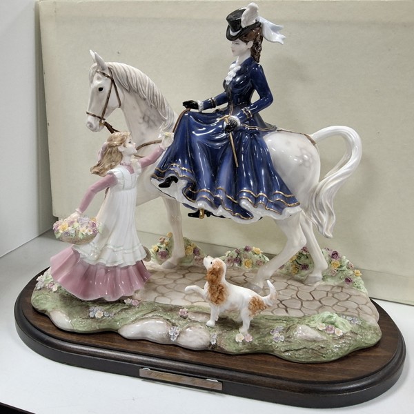 Limited edition Coalport figure group 'A Flower For My Lady' sold £1,100.jpg