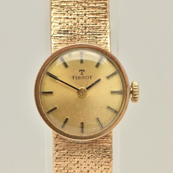 1970s 9ct gold Tissot watch on integrated bracelet sold £580.jpg