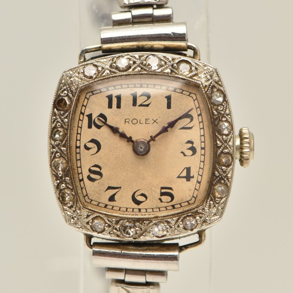 Early C20th 18ct gold and diamond set Rolex cocktail watch sold £950.jpg
