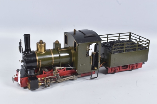 Lot 196: A Roundhouse G scale butane fired live steam remote control locomotive.