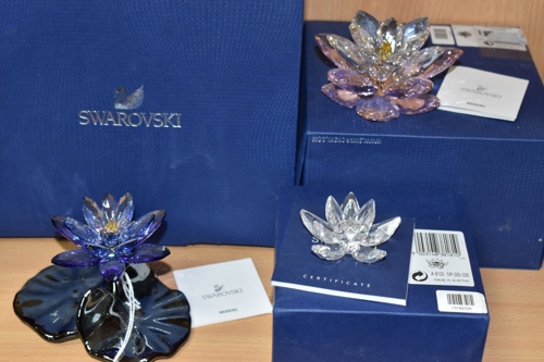Lot 821: Three Swarovski waterlilies.