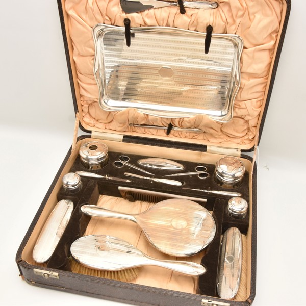 Early C20th silver travelling dressing table set sold £600.jpg