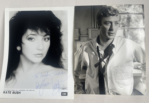 Signed photographs of Kate Bush and Michael Caine.