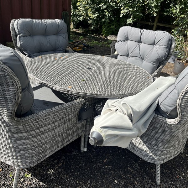Katie Blake rattan effect garden table and chairs sold £420.jpg