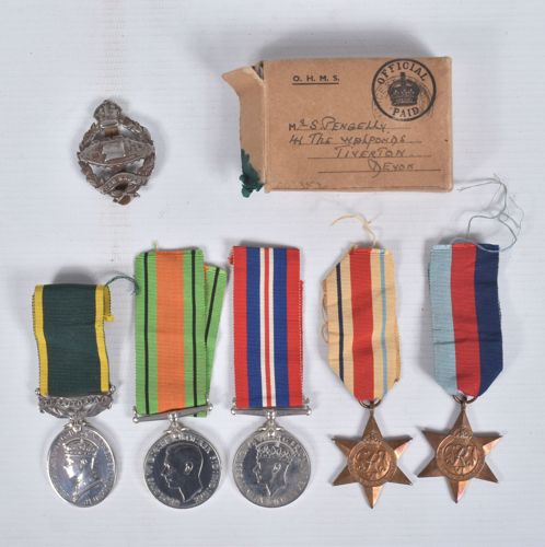 Lot 275: Four WW2 medals and a George VI Territorial Force Efficiency Medal.