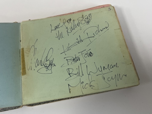 The complete set of Rolling Stones’ signatures in the album, including Brian Jones.