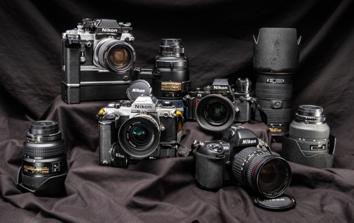 This collection of Nikon cameras and lenses was part of a sale of photographic equipment which exceeded £3,000 at auction.