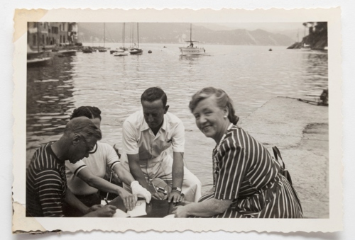 The Duke signs while Hilda’s friend Ethel looks on.