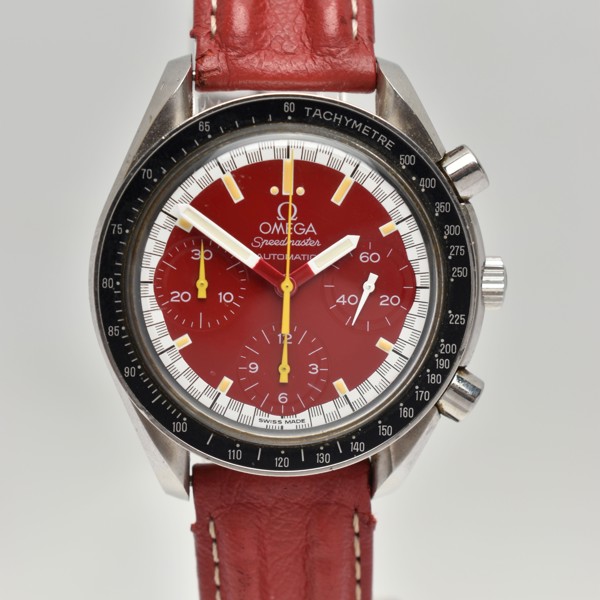 Omega Speedmaster reduced racing red Michael Schumacher special edition sold £2,000.jpg