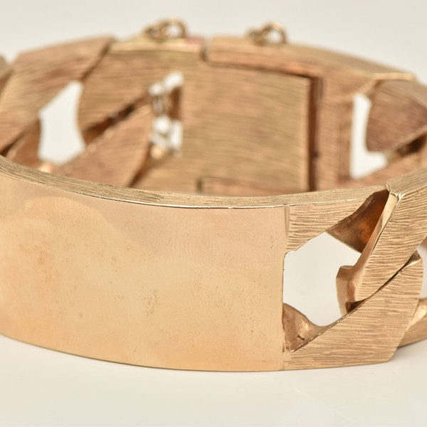 9ct gold curb link ID bracelet sold £7,800.jpg