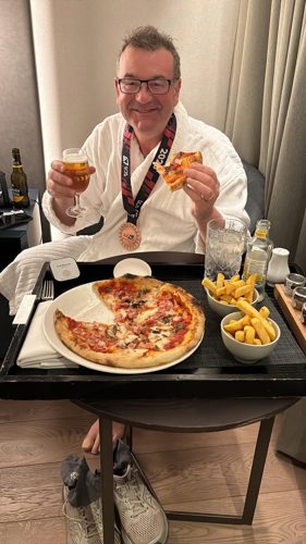 Now relax! Richard enjoys a well-deserved post-run meal.