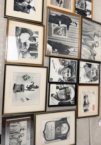 The archive includes framed, signed autographs and memorabilia relating to some of the biggest names in 20th century motorsport.