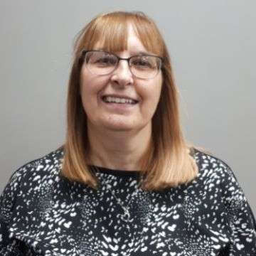 Suzanne Collins - Receptionist