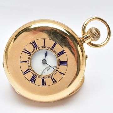 Sold £1,800: An 18ct gold late Victorian half hunter pocket watch.