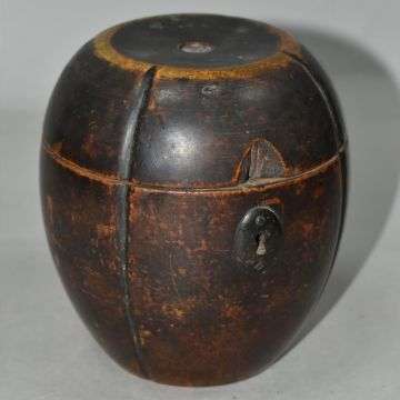 This George III stained fruitwood melon-shaped tea caddy sold at auction for £1,050 recently.