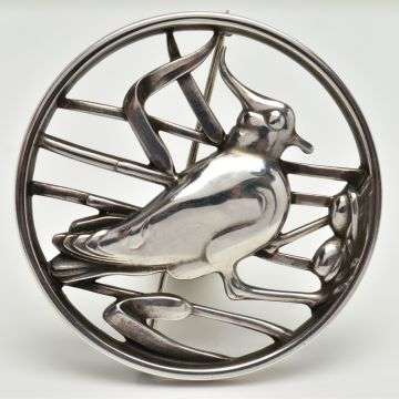 This Georg Jensen silver brooch dating back to 1963 sold at auction in the spring for £300. Its openwork design displays a bird in a nest within reeds.