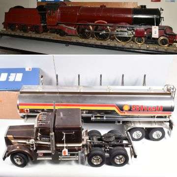 Top: Lot 310,a 3.5ins gauge live steam locomotive. Below: Lot 114, a Tamiya radio control tanker.