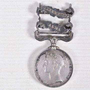 Lot 386: A Crimea medal with two clasps for Inkermann and Alma.
