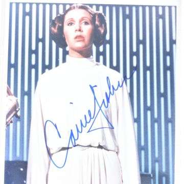 The signed photograph of Carrie Fisher as Princess Leia in Star Wars.